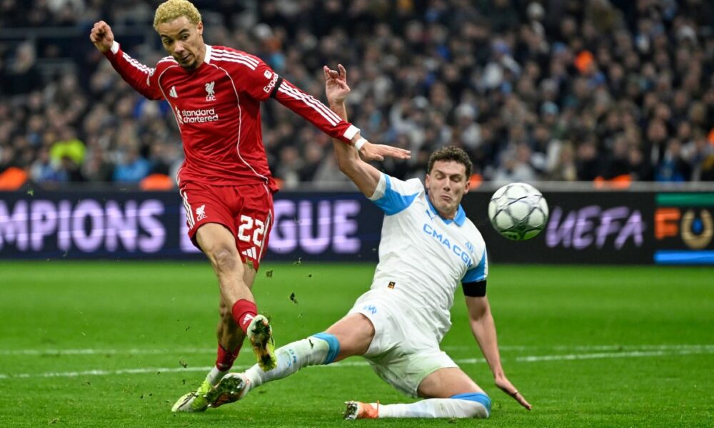 Liverpool's Hugo Ekitike, left, kicks the ball during the Champions League opening phase soccer match between Marseille and Liverpool in Marseille, France, Wednesday, Jan. 21, 2026. (AP Photo/Philippe Magoni)