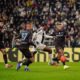 Juventus' Jonathan David, center, scores their side's first goal of the game during the Italian Serie A soccer match between Juventus and Napoli in Turin, Italy, Sunday, Jan. 25, 2026. (Marco Alpozzi/LaPresse via AP)