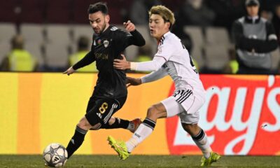 Qarabag's Marko Jankovic, left, and Frankfurt's Ritsu Doan chase the ball during the Champions League opening phase soccer match between Qarabag and Eintracht Frankfurt in Baku, Azerbaijan, Wednesday, Jan. 21, 2026. (AP Photo)