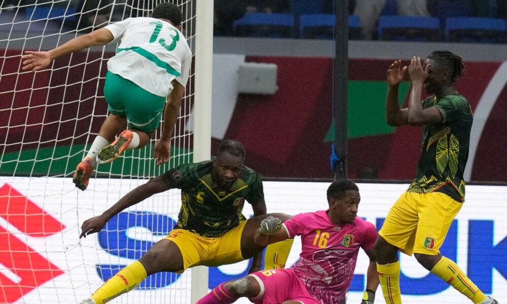 Senegal's Iliman Ndiaye, top left, reacts after scoring the opening goal of his team during the Africa Cup of Nations quarterfinal soccer match between Senegal and Mali in Tangier, Morocco, Friday, Jan. 9, 2026. (AP Photo/Themba Hadebe)