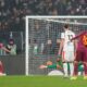 Roma's Lorenzo Pellegrini, second from left, scores his side's first goal by the penalty during the Serie A soccer match between Roma and AC Milan in Rome, Sunday, Jan. 25, 2026. (AP Photo/Gregorio Borgia)