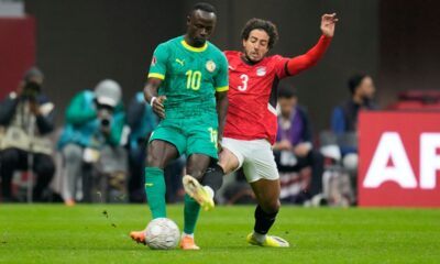 Senegal's Sadio Mane, left, is challenged by Egypt's Mohamed Hany during the Africa Cup of Nations semifinal soccer match between Senegal and Egypt, in Tangier, Morocco, Wednesday, Jan. 14, 2026. (AP Photo/Themba Hadebe)