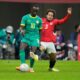 Senegal's Sadio Mane, left, is challenged by Egypt's Mohamed Hany during the Africa Cup of Nations semifinal soccer match between Senegal and Egypt, in Tangier, Morocco, Wednesday, Jan. 14, 2026. (AP Photo/Themba Hadebe)