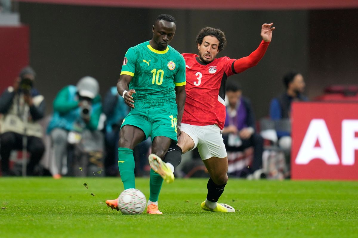 Senegal's Sadio Mane, left, is challenged by Egypt's Mohamed Hany during the Africa Cup of Nations semifinal soccer match between Senegal and Egypt, in Tangier, Morocco, Wednesday, Jan. 14, 2026. (AP Photo/Themba Hadebe)