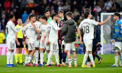 Real Madrid players celebrate at the end of the Spanish La Liga soccer match against Levante in Madrid, Spain, Saturday, Jan. 17, 2026. (AP Photo/Jose Breton)