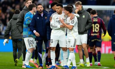 Real Madrid's Kylian Mbappe (10) and teammates celebrate at the end of the Spanish La Liga soccer match against Levante in Madrid, Spain, Saturday, Jan. 17, 2026. (AP Photo/Jose Breton)