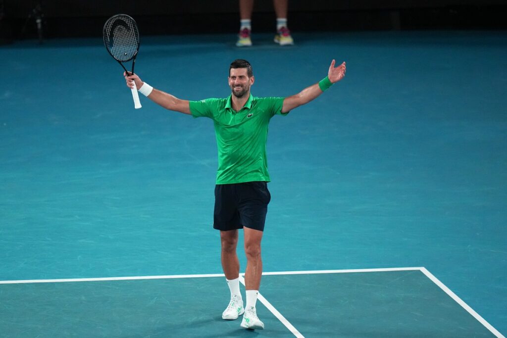 Novak Djokovic of Serbia celebrates after defeating Jannik Sinner of Italy in their semifinal match at the Australian Open tennis championship in Melbourne, Australia, early Saturday, Jan. 31, 2026. (AP Photo/Dar Yasin)