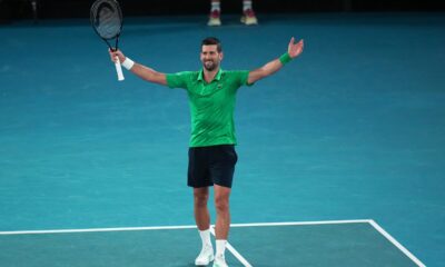 Novak Djokovic of Serbia celebrates after defeating Jannik Sinner of Italy in their semifinal match at the Australian Open tennis championship in Melbourne, Australia, early Saturday, Jan. 31, 2026. (AP Photo/Dar Yasin)