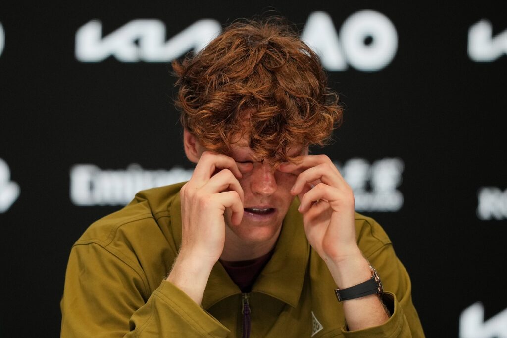 Jannik Sinner of Italy reacts during a press conference following his semifinal loss to Novak Djokovic of Serbia at the Australian Open tennis championship in Melbourne, Australia, Saturday, Jan. 31, 2026. (AP Photo/Dita Alangkara)