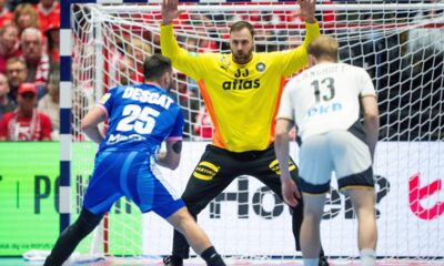 Germany's goalkeeper Andreas Wolff in action with France's Hugo Descat during the Euro 2026 main round men's handball match between Germany and France at Jyske Bank Boxen in Herning, Denmark, Wednesday, Jan. 28, 2026. (Bo Amstrup/Ritzau Scanpix via AP)