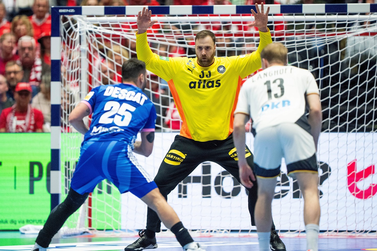 Germany's goalkeeper Andreas Wolff in action with France's Hugo Descat during the Euro 2026 main round men's handball match between Germany and France at Jyske Bank Boxen in Herning, Denmark, Wednesday, Jan. 28, 2026. (Bo Amstrup/Ritzau Scanpix via AP)