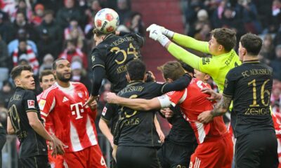 Augsburg's goalkeeper Finn Dahmen in action during the German Bundesliga soccer match between Bayern Munich and FC Augsburg in Munich, Saturday, Jan. 24, 2026. (Peter Kneffel/dpa via AP)