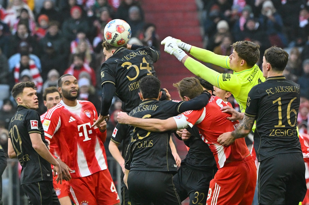 Augsburg's goalkeeper Finn Dahmen in action during the German Bundesliga soccer match between Bayern Munich and FC Augsburg in Munich, Saturday, Jan. 24, 2026. (Peter Kneffel/dpa via AP)