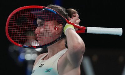 Elena Rybakina of Kazakhstan reacts during her match against Aryna Sabalenka of Belarus in the women's singles final at the Australian Open tennis championship in Melbourne, Australia, Saturday, Jan. 31, 2026. (AP Photo/Dita Alangkara)