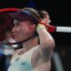 Elena Rybakina of Kazakhstan reacts during her match against Aryna Sabalenka of Belarus in the women's singles final at the Australian Open tennis championship in Melbourne, Australia, Saturday, Jan. 31, 2026. (AP Photo/Dita Alangkara)