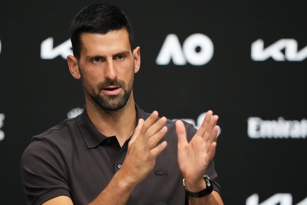 Novak Djokovic of Serbia gestures during a press conference ahead of the Australian Open tennis championship in Melbourne, Australia, Saturday, Jan. 17, 2026. (AP Photo/Aaron Favila)