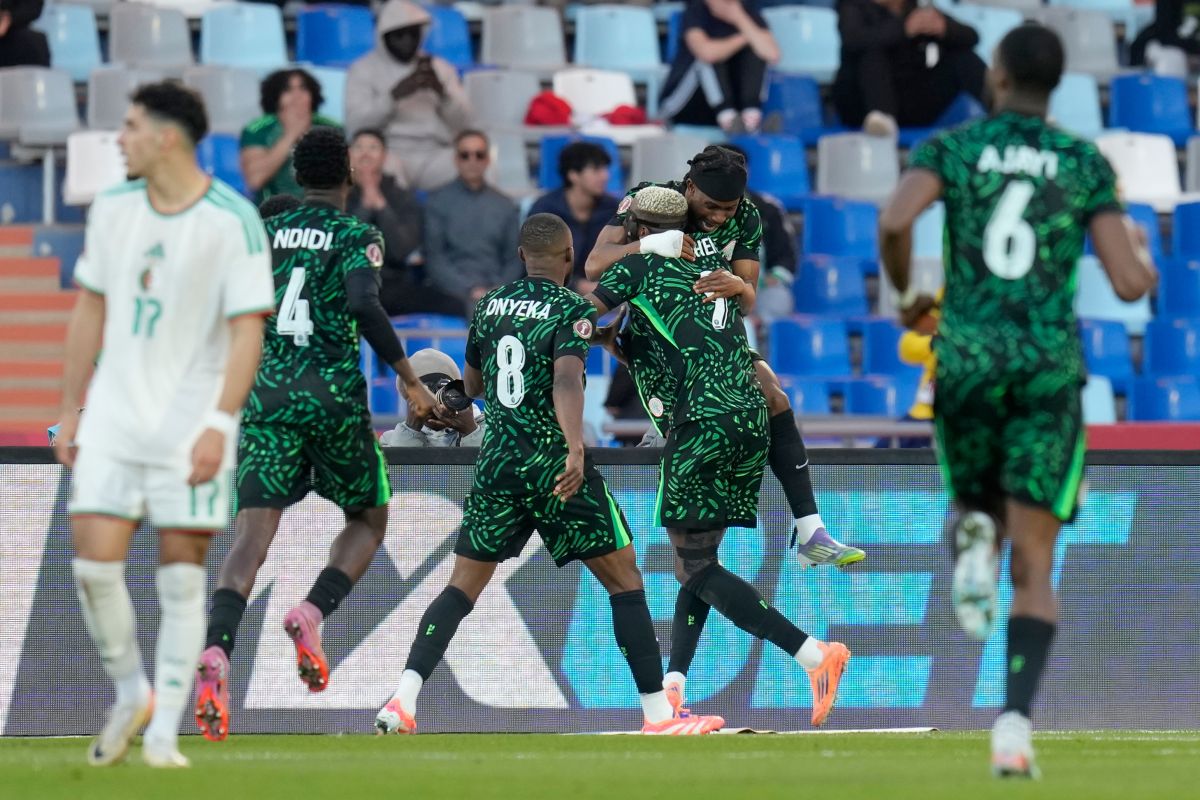Nigeria's Victor Osimhen celebrates with teammates after scoring the opening goal during the Africa Cup of Nations quarterfinal soccer match between Nigeria and Algeria, in Marrakech, Morocco, Saturday, Jan. 10, 2026. (AP Photo/Themba Hadebe)