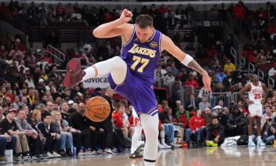 Los Angeles Lakers guard Luka Doncic plays with the basketball during the second half of an NBA game against the Chicago Bulls in Chicago, Monday, Jan. 26, 2026. (AP Photo/Nam Y. Huh)