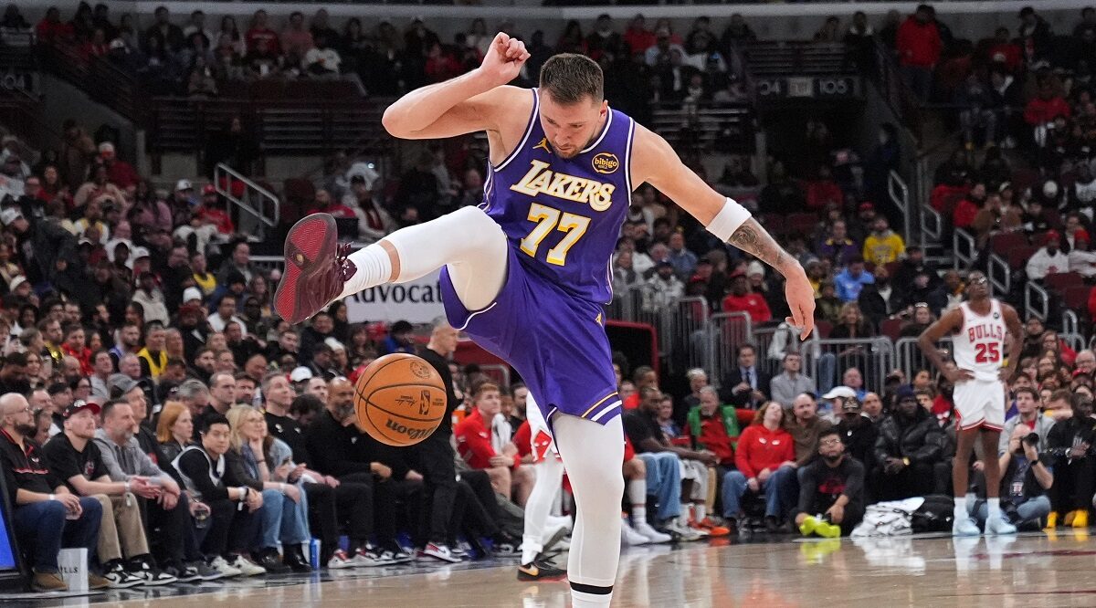 Los Angeles Lakers guard Luka Doncic plays with the basketball during the second half of an NBA game against the Chicago Bulls in Chicago, Monday, Jan. 26, 2026. (AP Photo/Nam Y. Huh)