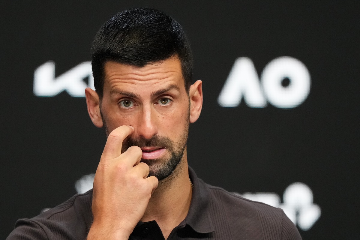 Novak Djokovic of Serbia reacts during a press conference ahead of the Australian Open tennis championship in Melbourne, Australia, Saturday, Jan. 17, 2026. (AP Photo/Aaron Favila)