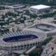 FILE - The Parc des Princes stadium, center, which hosts the Paris Saint-Germain soccer team, and the Jean Bouin stadium, right, which hosts the Paris FC soccer team are seen in Paris, France, Tuesday, July 11, 2023. Atop is the Roland Garros stadium. (AP Photo/Christophe Ena, File)