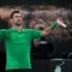 Novak Djokovic of Serbia reacts after defeating Botic van de Zandschulp of the Netherlands in their third round match at the Australian Open tennis championship in Melbourne, Australia, Saturday, Jan. 24, 2026. (AP Photo/Dita Alangkara)