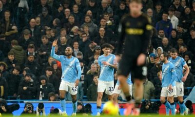 Manchester City's Antoine Semenyo, left, celebrates after scoring the opening goal during the English Premier League soccer match between Manchester City and Fulham in Manchester, England, Wednesday, Feb. 11, 2026. (AP Photo/Dave Thompson)