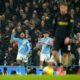 Manchester City's Antoine Semenyo, left, celebrates after scoring the opening goal during the English Premier League soccer match between Manchester City and Fulham in Manchester, England, Wednesday, Feb. 11, 2026. (AP Photo/Dave Thompson)
