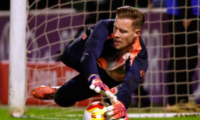 FILE - Barcelona's goalkeeper Marc-Andre ter Stegen warms up prior to the start of the Copa del Rey soccer match between Guadalajara and Barcelona in Guadalajara, Spain, Dec. 16, 2025. (AP Photo/Rudy Garcia, File)