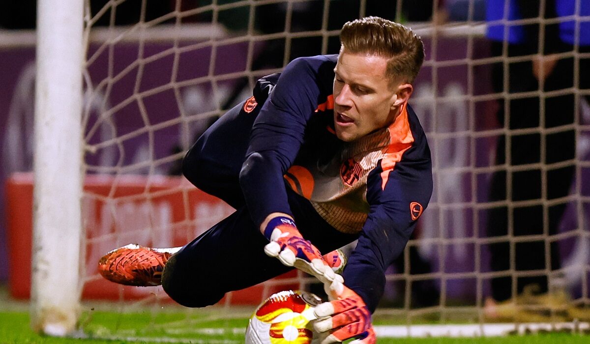 FILE - Barcelona's goalkeeper Marc-Andre ter Stegen warms up prior to the start of the Copa del Rey soccer match between Guadalajara and Barcelona in Guadalajara, Spain, Dec. 16, 2025. (AP Photo/Rudy Garcia, File)