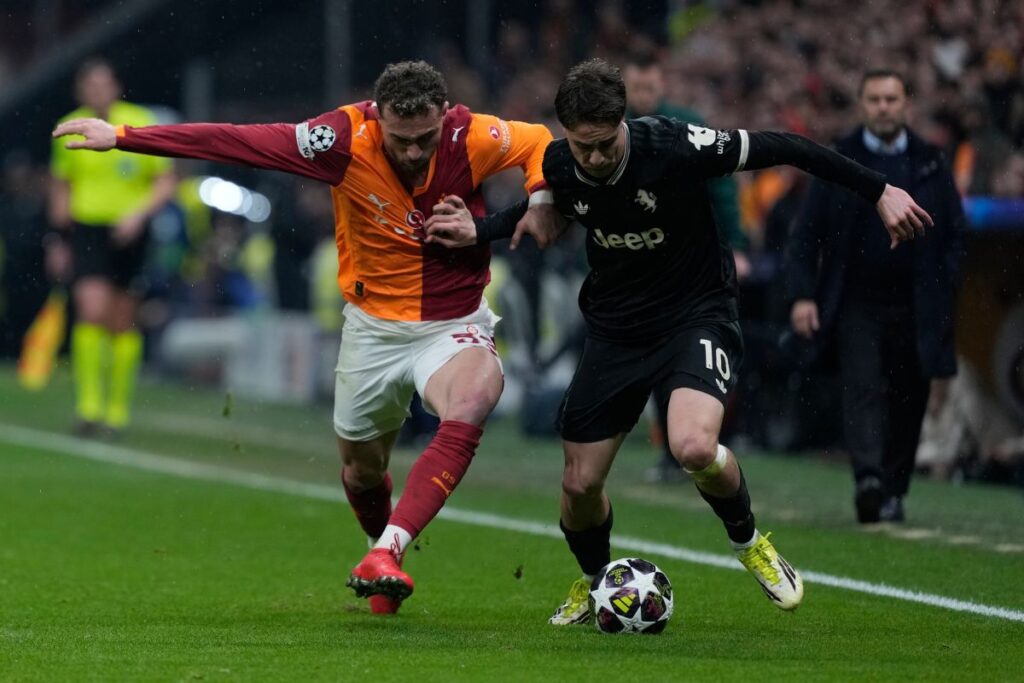 Galatasaray's Baris Yilmaz, left, tries to stop Juventus' Kenan Yildiz during a Champions league play-off first leg soccer match between Galatasaray and Juventus, in Istanbul, Turkey, Tuesday, Feb. 17, 2026. (AP Photo/Khalil Hamra)