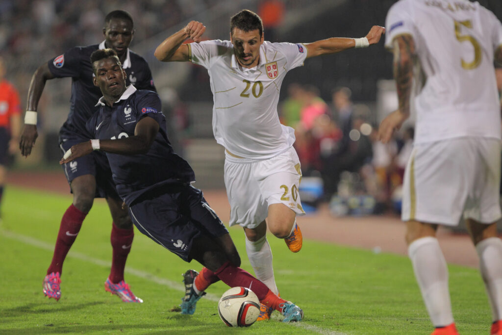 ZDRAVKO KUZMANOVIC fudbaler reprezentacije Srbije na prijateljskoj utakmici kvalifikacija za UEFA Evropsko prvenstvo protiv PAUL POGBA Pol Pogba iz Francuske na stadionu Partizana, Beograd 07.09.2014. godine Foto: Marko Metlas Fudbal, Reprezentacija, Srbija, Francuska, Prijateljska utakmica