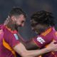 Roma's Bryan Cristante, left, celebrates after scoring 1-0, with his teammate Roma's Manu Kone, during the Serie A soccer match between Roma and Cremonese, in Rome, Italy, Sunday, Feb. 22, 2026. (Alfredo Falcone/LaPresse via AP)