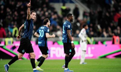 Inter Milan's Francesco Pio Esposito, left, celebrates after scoring a goal during the Serie A soccer match between Inter Milan and Juventus, Saturday, Feb. 14, 2026, in Milan, Italy. (Marco Alpozzi/LaPresse via AP)