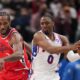Philadelphia 76ers guard Tyrese Maxey (0) grabs the ball against Los Angeles Clippers forward Kawhi Leonard (2) during the second half of an NBA basketball game Monday, Feb. 2, 2026, in Inglewood, Calif. (AP Photo/Jae C. Hong)