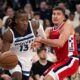 Minnesota Timberwolves guard Ayo Dosunmu, left, drives to the basket as Los Angeles Clippers guard Bogdan Bogdanovic defends during the second half of an NBA basketball game Thursday, Feb. 26, 2026, in Inglewood, Calif. (AP Photo/Kyusung Gong)
