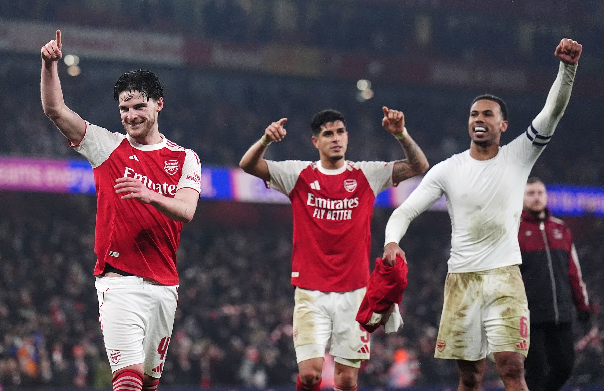 Arsenal players, from left, Declan Rice, Piero Hincapie and Gabriel celebrate after the English League Cup semifinal second leg soccer match between Arsenal and Chelsea in London, Tuesday, Feb. 3, 2026. (John Walton/PA via AP)