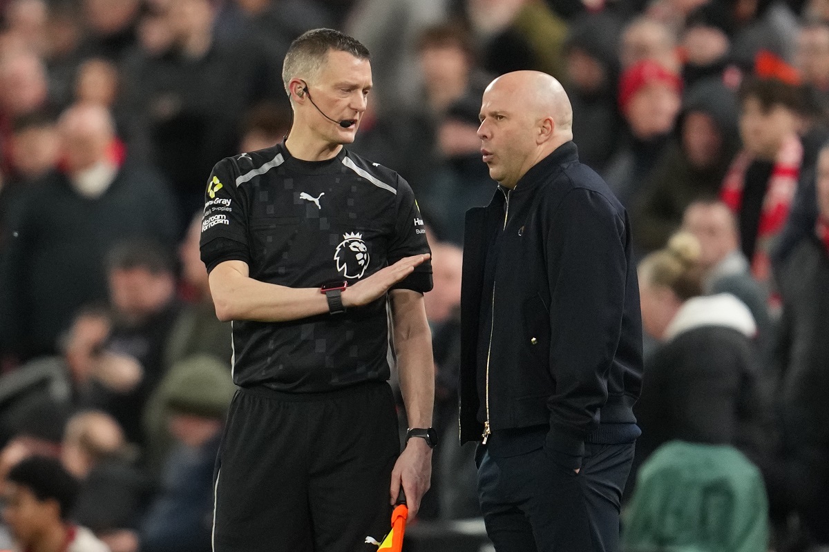 Liverpool's manager Arne Slot talks to a referee during the English Premier League soccer match between Liverpool and Manchester City in Liverpool, England, Sunday, Feb. 8, 2026. (AP Photo/Jon Super)