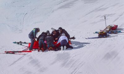 In this image taken from video provided by Olympic Broadcasting Services, OBS, United States' Lindsey Vonn is prepared for evacuation after crashing during an alpine ski women's downhill race, at the 2026 Winter Olympics, in Cortina d'Ampezzo, Italy, Sunday, Feb. 8, 2026. (Olympic Broadcasting Services via AP)