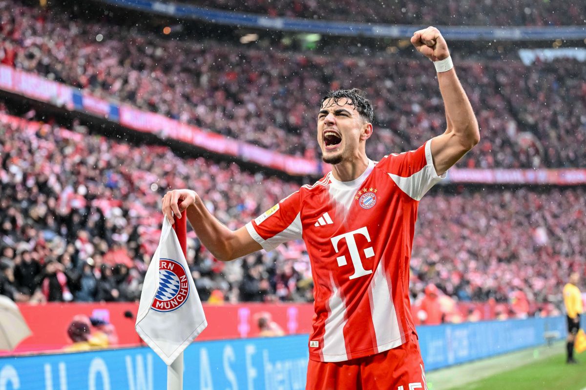 Munich's Aleksandar Pavlovic celebrates scoring during the Bundesliga soccer match between Bayern Munich and Eintracht Frankfurt in Munich, Germany, Saturday Feb. 21, 2026. (Harry Langer/dpa via AP)