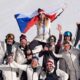 Silver medalist Czechia's Eva Adamczykova celebrates with team members after the women's snowboard cross finals at the 2026 Winter Olympics, in Livigno, Italy, Friday, Feb. 13, 2026. (AP Photo/Lindsey Wasson)