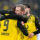 Dortmund's Serhou Guirassy, left, celebrates with Julian Ryerson after scoring his side's third goal during the German Bundesliga soccer match between Borussia Dortmund and FSV Mainz 05 in Dortmund, Germany, Friday, Feb. 13, 2026. (AP Photo/Martin Meissner)