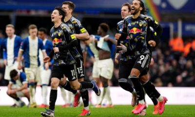 Leeds United players celebrate after winning the penalty shoot out at the end of the Emirates FA Cup fourth round match between Leeds United and Bimingham City, in Birmingham, England, Sunday Feb. 15, 2026. (Jacob King/PA via AP)