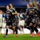 Leeds United players celebrate after winning the penalty shoot out at the end of the Emirates FA Cup fourth round match between Leeds United and Bimingham City, in Birmingham, England, Sunday Feb. 15, 2026. (Jacob King/PA via AP)