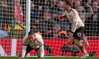 Liverpool's Alexis Mac Allister, right, celebrates scoring his side's first goal during the English Premier League soccer match between Nottingham Forest and Liverpool in Nottingham, Sunday, Feb. 22, 2026.(AP Photo/Dave Shopland)