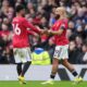 Manchester United's Amad Diallo, left, and Bryan Mbeumo react after a goal during the English Premier League soccer match between Manchester United and Tottenham in Manchester, England, Saturday, Feb. 7, 2026. (AP Photo/Jon Super)