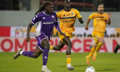 iorentina's Moise Kean, left, and Pisa's Rafiu Durosinmi in action during the Serie A soccer match between Pisa and Fiorentina, in Florence, Italy, Monday, Feb. 23, 2026. (Marco Bucco/LaPresse via AP)