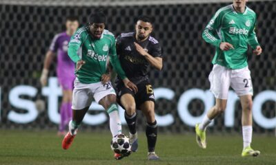 Newcastle's Anthony Elanga, left, fights for the ball with Qarabag's Leandro Andrade during the Champions League play-off first leg soccer match between Qarabag and Newcastle in Baku, Azerbaijan, Wednesday, Feb. 18, 2026. (AP Photo)