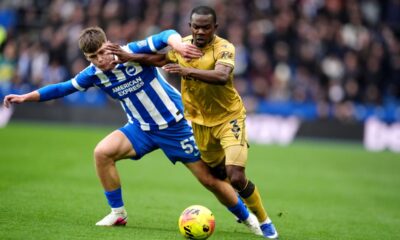 Brighton and Hove Albion's Harry Howell, left, battles for the ball with Crystal Palace's Tyrick Mitchell during their English Premier League soccer match in Brighton, England, Sunday, Feb. 8, 2026. (Adam Davy/PA via AP)