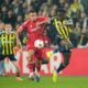 Fenerbahce's Sidiki Cherif, right, and Nottingham Forest's Murillo fight for the ball during a Europa league play-off first leg soccer match between Fenerbahce and Nottingham Forest in Istanbul, Turkey, Thursday, Feb. 19, 2026. (AP Photo/Emrah Gurel)
